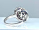 Bague 57 Bague marguerite en or blanc 18 carats, diamants et rubis 58 Facettes AB308