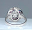 Bague 57 Bague marguerite en or blanc 18 carats, diamants et rubis 58 Facettes AB308
