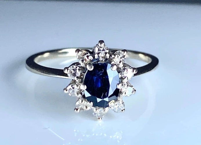 Bague 55 Bague marguerite en or blanc 18 carats avec saphir et diamants 58 Facettes AB336