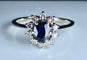 Bague 55 Bague marguerite en or blanc 18 carats avec saphir et diamants 58 Facettes AB336