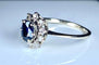 Bague 55 Bague marguerite en or blanc 18 carats avec saphir et diamants 58 Facettes AB336