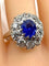 Bague 57 Bague marguerite en or blanc 18 carats et platine, saphir et diamants 58 Facettes AB347