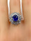 Bague 57 Bague marguerite en or blanc 18 carats et platine, saphir et diamants 58 Facettes AB347