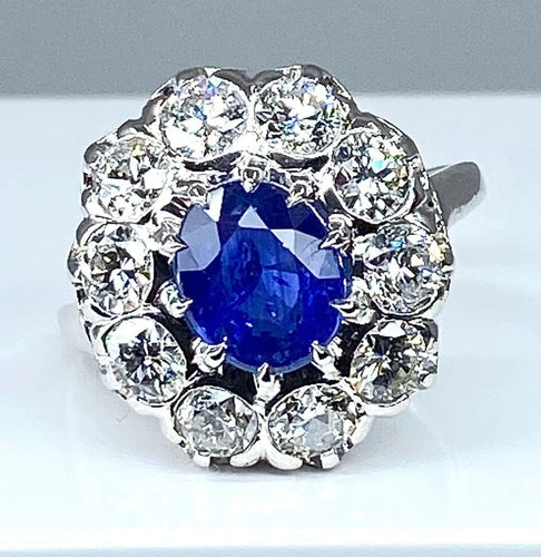 Bague 57 Bague marguerite en or blanc 18 carats et platine, saphir et diamants 58 Facettes AB347