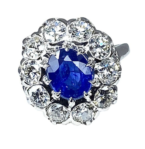 Bague 57 Bague marguerite en or blanc 18 carats et platine, saphir et diamants 58 Facettes AB347