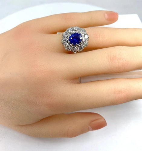 Bague 57 Bague marguerite en or blanc 18 carats et platine, saphir et diamants 58 Facettes AB347
