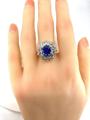 Bague 57 Bague marguerite en or blanc 18 carats et platine, saphir et diamants 58 Facettes AB347