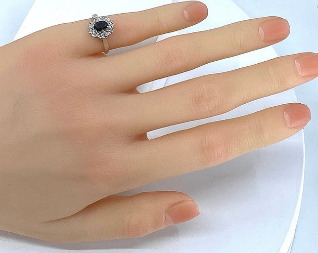 Bague 46 Bague marguerite en or blanc 18 carats au saphir et diamants 58 Facettes AB361