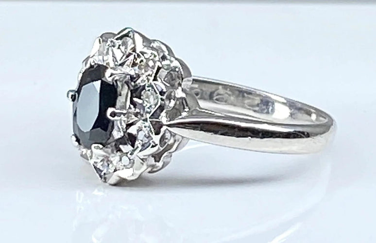 Bague 46 Bague marguerite en or blanc 18 carats au saphir et diamants 58 Facettes AB361