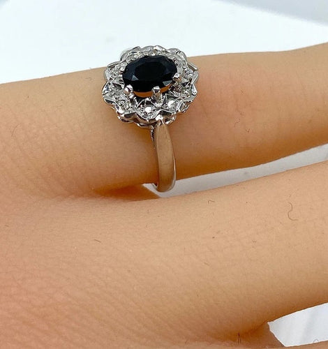 Bague 46 Bague marguerite en or blanc 18 carats au saphir et diamants 58 Facettes AB361