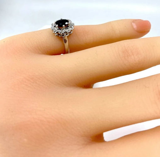 Bague 46 Bague marguerite en or blanc 18 carats au saphir et diamants 58 Facettes AB361
