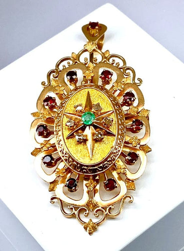 Pendentif Broche pendentif en or 18 carats aux grenats, émeraude et diamants 58 Facettes A 397