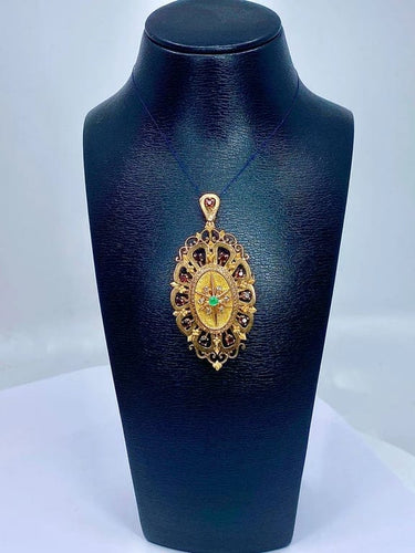 Pendentif Broche pendentif en or 18 carats aux grenats, émeraude et diamants 58 Facettes A 397
