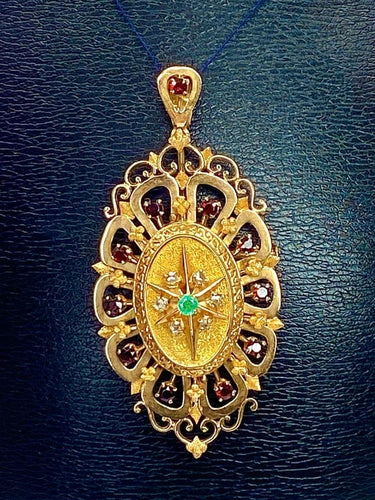 Pendentif Broche pendentif en or 18 carats aux grenats, émeraude et diamants 58 Facettes A 397
