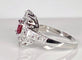 Bague 51 Bague marguerite en or blanc 18 carats avec rubis et diamants 58 Facettes AB413