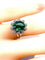 Bague 48 Bague en or blanc avec pierre verte et 10 diamants 58 Facettes AB426