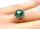 Bague 48 Bague en or blanc avec pierre verte et 10 diamants 58 Facettes AB426