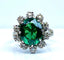 Bague 48 Bague en or blanc avec pierre verte et 10 diamants 58 Facettes AB426