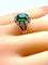 Bague 48 Bague en or blanc avec pierre verte et 10 diamants 58 Facettes AB426