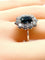 Bague 55 Bague marguerite en or blanc 18 carats, saphir 2,11 ct et diamants 58 Facettes AB431