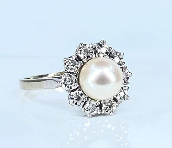 Bague 49 Bague marguerite en or blanc 18 carats et platine, perle et diamants 58 Facettes AB456