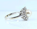 Bague 49 Bague marguerite en or blanc 18 carats et platine, perle et diamants 58 Facettes AB456
