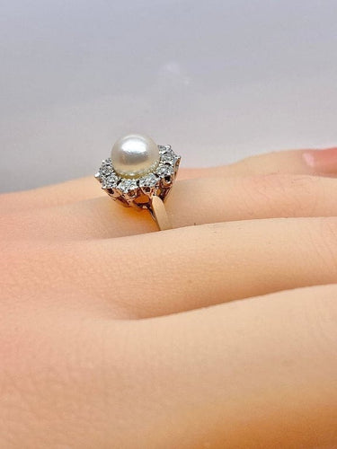 Bague 49 Bague marguerite en or blanc 18 carats et platine, perle et diamants 58 Facettes AB456