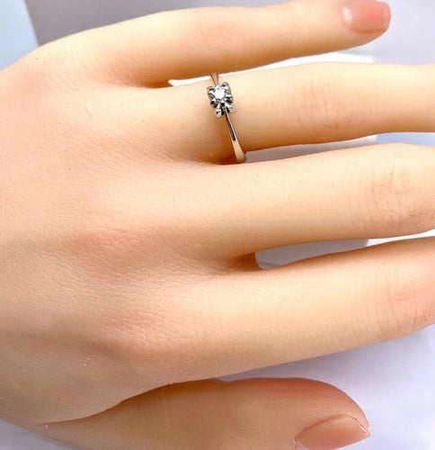 Bague 50 Bague solitaire en or blanc 18 carats et diamant taille brillant 58 Facettes AB513