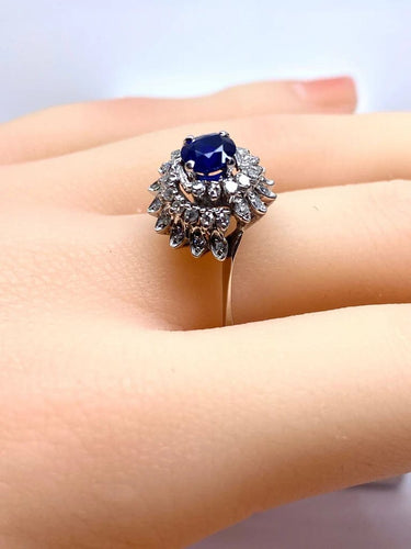 Bague 54 Bague tourbillon en or blanc 18 carats, saphir et diamants 58 Facettes AB519