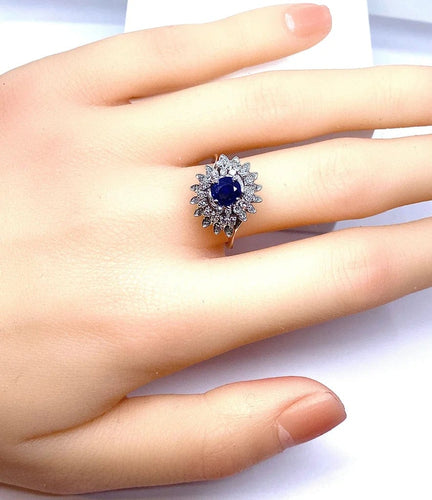 Bague 54 Bague tourbillon en or blanc 18 carats, saphir et diamants 58 Facettes AB519