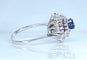 Bague 54 Bague tourbillon en or blanc 18 carats, saphir et diamants 58 Facettes AB519