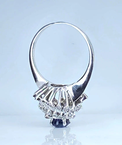Bague 54 Bague tourbillon en or blanc 18 carats, saphir et diamants 58 Facettes AB519