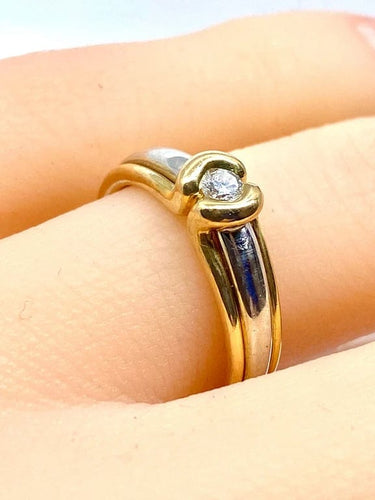 Bague 50 Bague solitaire en or jaune et or blanc 18 carats et diamant 58 Facettes AB556