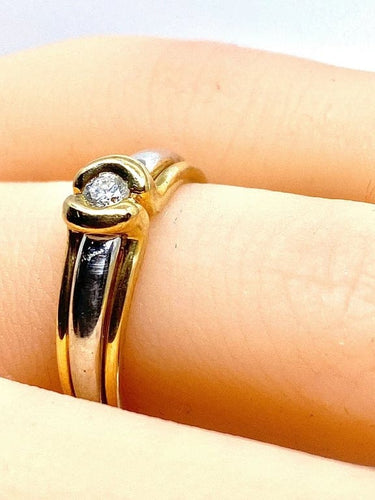 Bague 50 Bague solitaire en or jaune et or blanc 18 carats et diamant 58 Facettes AB556