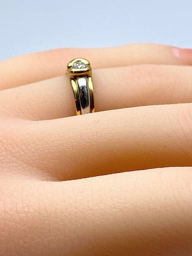 Bague 50 Bague solitaire en or jaune et or blanc 18 carats et diamant 58 Facettes AB556