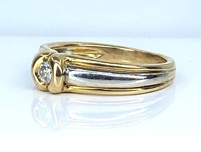 Bague 50 Bague solitaire en or jaune et or blanc 18 carats et diamant 58 Facettes AB556