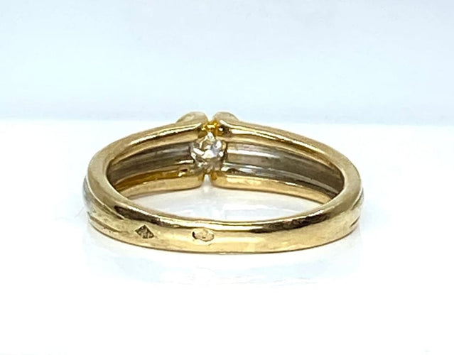 Bague 50 Bague solitaire en or jaune et or blanc 18 carats et diamant 58 Facettes AB556