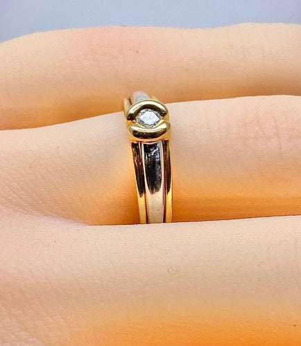 Bague 50 Bague solitaire en or jaune et or blanc 18 carats et diamant 58 Facettes AB556
