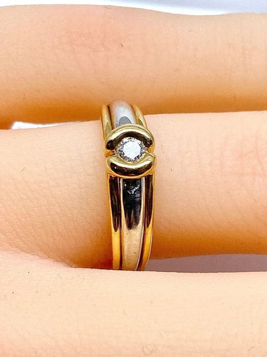 Bague 50 Bague solitaire en or jaune et or blanc 18 carats et diamant 58 Facettes AB556
