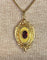 Pendentif Pendentif porte-souvenir ouvrant en or 18 carats et grenat 58 Facettes AB574