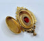 Pendentif Pendentif porte-souvenir ouvrant en or 18 carats et grenat 58 Facettes AB574