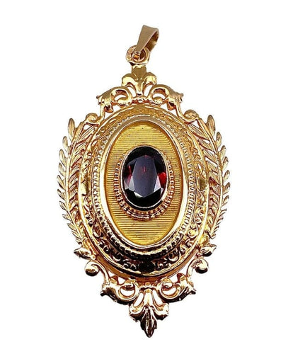 Pendentif Pendentif porte-souvenir ouvrant en or 18 carats et grenat 58 Facettes AB574