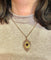Pendentif Pendentif porte-souvenir ouvrant en or 18 carats et grenat 58 Facettes AB574