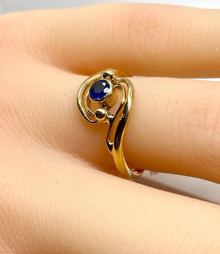 Bague 51 Bague tourbillon en or jaune 18 carats et saphir 58 Facettes AB586