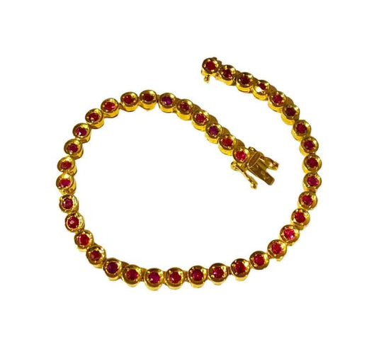 Bracelet Bracelet ligne en or jaune 18 carats et rubis 58 Facettes AB609