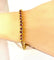 Bracelet Bracelet ligne en or jaune 18 carats et rubis 58 Facettes AB609