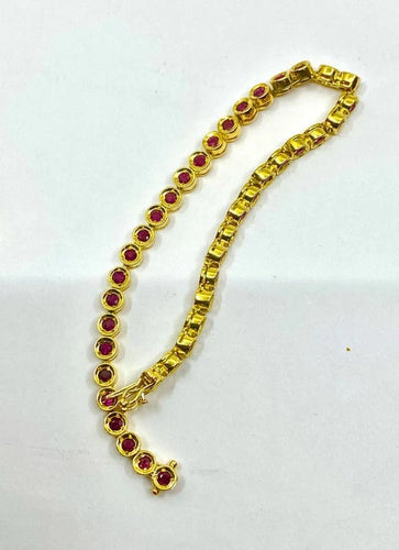 Bracelet Bracelet ligne en or jaune 18 carats et rubis 58 Facettes AB609