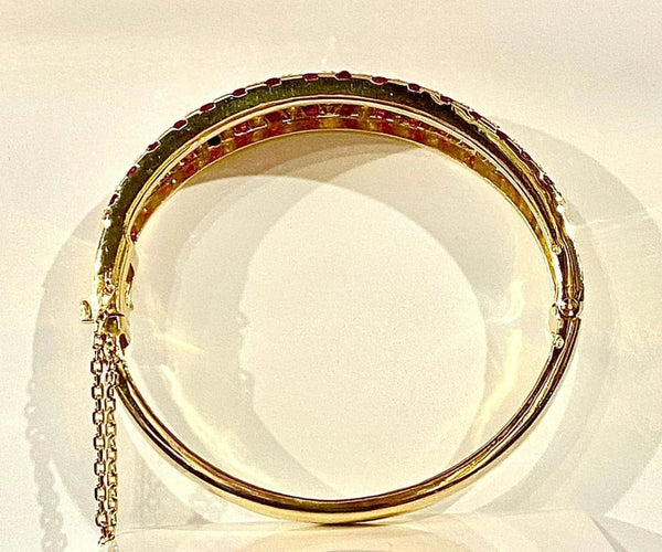 Bracelet Bracelet jonc ouvrant en or jaune 18 carats, rubis et diamants 58 Facettes AB608
