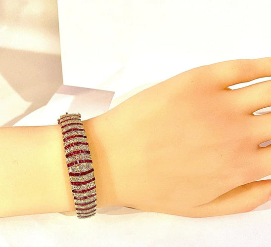 Bracelet Bracelet jonc ouvrant en or jaune 18 carats, rubis et diamants 58 Facettes AB608