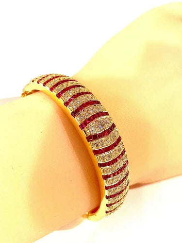 Bracelet Bracelet jonc ouvrant en or jaune 18 carats, rubis et diamants 58 Facettes AB608